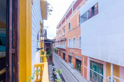 a view of an alley between two buildings at Hotel El Viajero #2 in Cartagena de Indias