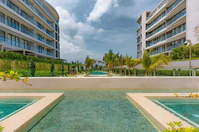 a swimming pool in front of a building at Bohemian 2BR - Morros Kai - Private pool & parking in Cartagena de Indias