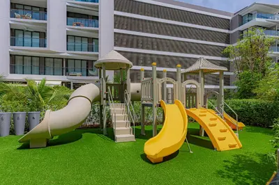 a playground in front of a building with a slide at Bohemian 2BR - Morros Kai - Private pool & parking in Cartagena de Indias