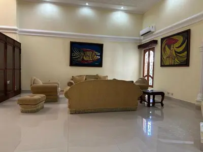 a large living room with couches and chairs in it at Casa Rey Colonial 1910 Manga - 7 Habitaciones in Cartagena de Indias