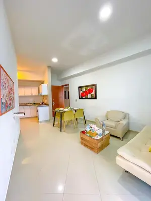 a living room with a couch and a table at Espectacular apartamento vista al mar in Cartagena de Indias