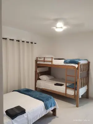 a room with two bunk beds in a room at Private pool cabin near the sea Puerto Velero in Tubará