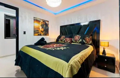 a bedroom with a large bed in a room at Modern Luxury 2BR with Private Jacuzzi in Cartagena de Indias