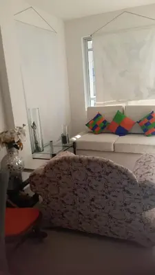 a living room with a couch and a window at Apartamento Sector Torices in Cartagena de Indias