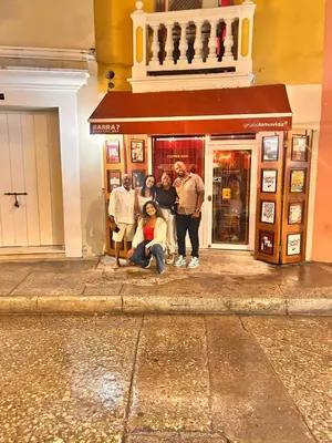 a group of people standing in front of a store at Cartagena Rumbera in Cartagena de Indias