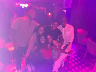 a group of people posing for a picture in a club at Cartagena Rumbera in Cartagena de Indias