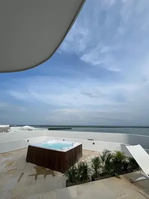 a swimming pool on top of a building at Apartamento en Cielo Mar Cartagena in Cartagena de Indias