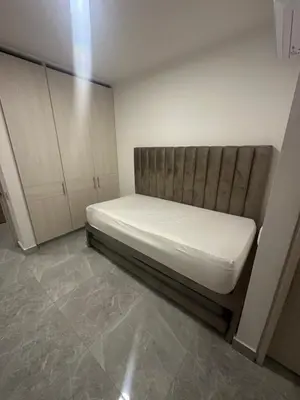 a small bedroom with a bed in a room at Apartamento cerca Malecón y CC mall plaza in Barranquilla