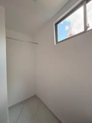 a room with a window and a white wall at Maru apartamentos #5 in Cartagena de Indias