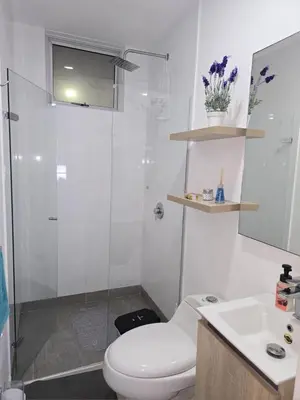 a bathroom with a toilet and a shower and a sink at Incredible apartment in Cartagena a few meters from the Sea in Cartagena de Indias