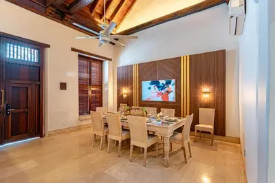 a dining room with a table and chairs at Luxury House in the heart of Cartagena with Jacuzzi in Cartagena de Indias