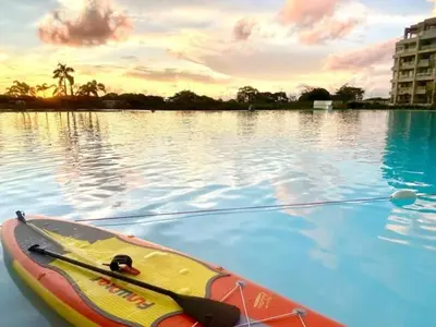 a kayak in the water in a lake at Apartamentos Baia Kristal - Escapada a Cartagena in Cartagena de Indias