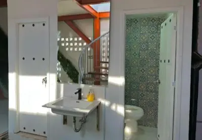 a bathroom with a sink and a toilet at Hotel Capsula CAPS Cartagena in Cartagena de Indias