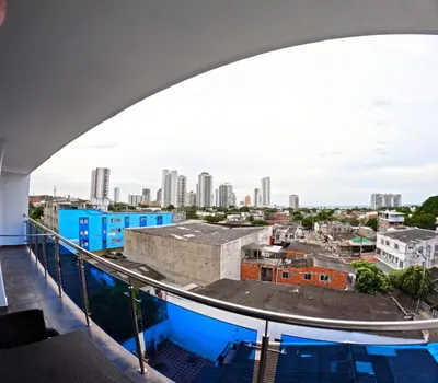a view of the city from the balcony of a building at Viewpoint apartment near the Historic Center in Cartagena de Indias