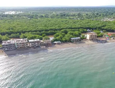 an aerial view of a resort on a beach at Mero Beach - Apartamento frente al mar en Tolú in San Silvestre