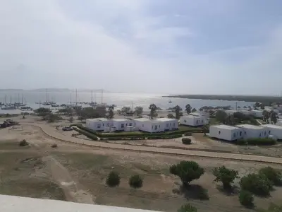 an aerial view of a building near the water at Marina Puerto Velero Cabaña in Tubará