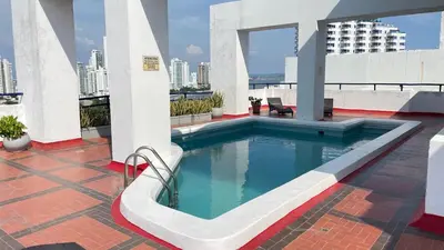 a swimming pool on the roof of a building at Apartamento Marina del Rey 1101 in Cartagena de Indias
