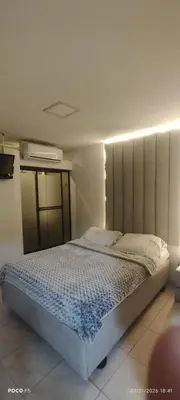 a bedroom with a bed in a room at Hotel WK Casa de Hospedaje in Barranquilla