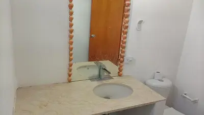 a bathroom with a sink and a toilet at Hostel cartagena in Cartagena de Indias