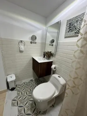 a bathroom with a toilet and a sink at House 4-71 in Cartagena de Indias