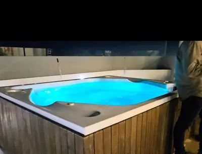 a jacuzzi tub with blue water in it at Brand New Perfectly Located 2bedroom in CieloMar in Cartagena de Indias