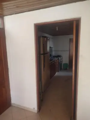 a kitchen with a refrigerator in a room at Sun Beach 41 in Cartagena de Indias