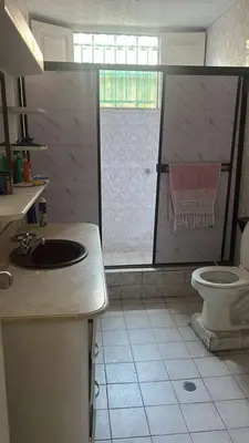 a bathroom with a sink and a toilet at Habitacion en casa zona carnaval in Barranquilla