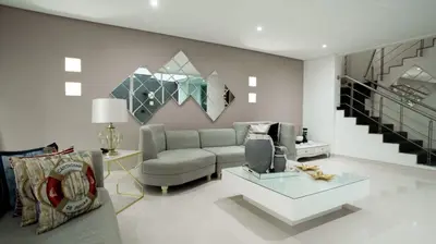 a living room with a couch and a table at MQ CROWN HOUSE CASTIllO in Cartagena de Indias