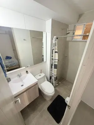 a bathroom with a toilet and a sink and a shower at Hermoso apartamento en Manzanillo del Mar in Cartagena de Indias