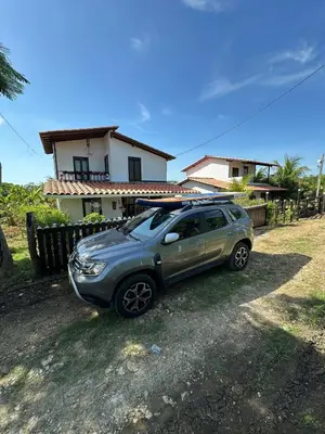 a car parked in front of a house at La Dolce Villa! in El Mamey