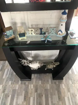a glass table with a boat on top of it at La Dolce Villa! in El Mamey
