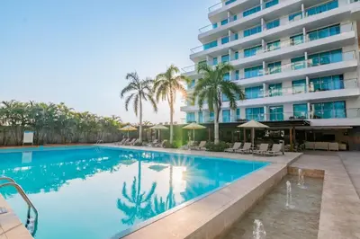 a swimming pool in front of a hotel at Morros Seaway 935 Apto 806 in Cartagena de Indias