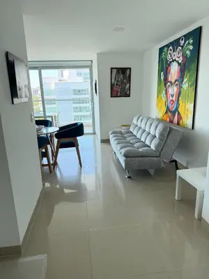 a living room with a couch and a table at Morros Seaway 935 Apto 806 in Cartagena de Indias
