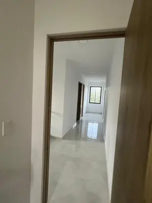 an empty hallway with a door in a house at Villa Sabanilla Casa bifamiliar campestre con piscina privada Aire acondicionado Tranquilidad total in Puerto Colombia
