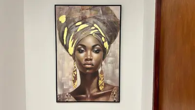 a painting of a woman wearing a turban at Hotel Getsemaní Central in Cartagena de Indias