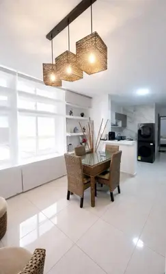 a dining room with a table and chairs at Comfortable in the heart of the city! in Estación El Salto