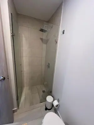 a bathroom with a shower and a toilet at Terraza del Mar in Santa Marta