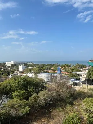 a view of a city with buildings and the ocean at Terraza del Mar in Santa Marta