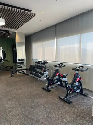 a gym with several exercise bikes in a room at Terraza del Mar in Santa Marta