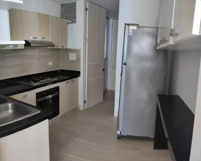 a kitchen with a stainless steel refrigerator in it at Apto Coveñas in Coveñas