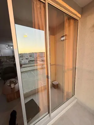 a balcony with a glass door with a view at Apartamento Hermoso en Manzanillo del Mar Cartagena in Cartagena de Indias