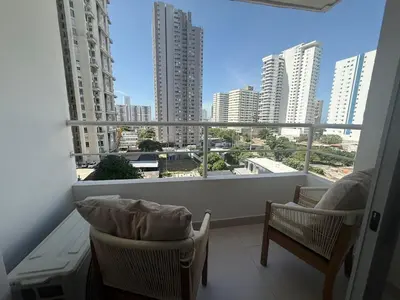 a balcony with a view of a city with tall buildings at Apartamento con cercania al Mar y centro historico in Cartagena de Indias
