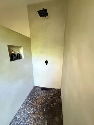 a room with a wall with a small hole in it at Private loft near the airport with fast WiFi in Cartagena de Indias