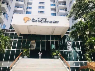 a man stands in front of the mexico consulate building at Cartagena Sotavento Laguito in Cartagena de Indias