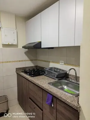 a kitchen with a sink and a stove at Lujoso Apartamento en Cartagena in Cartagena de Indias