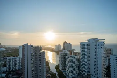 a view of a city with tall buildings and the ocean at Luxury apartment with ocean view 15th floor in Cartagena de Indias