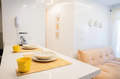a living room with two bowls on a table at Luxury apartment with ocean view 15th floor in Cartagena de Indias