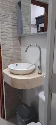 a bathroom with a sink and a toilet at Habitación Luminosa Manga in Cartagena de Indias