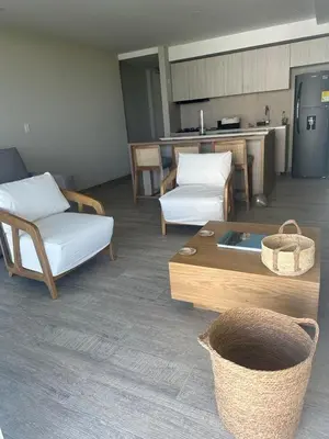 a living room with a couch and a coffee table at Exclusivo apartamento para descanso en Cartagena in Cartagena de Indias