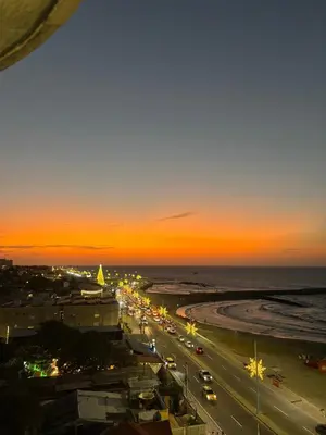 a view of a street at night with the ocean at Apartamento con la mejor ubicación y vista al mar in Cartagena de Indias
